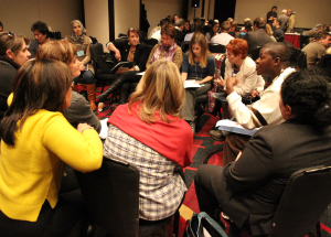 Participants brainstorming in a workshop