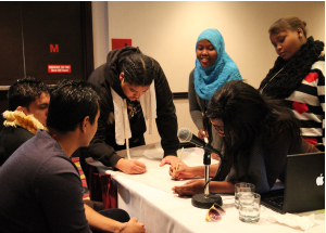 Participants preparing to present ideas at a workshop